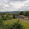 Hajtovka, v pozadí dedina Údol a pohorie Čergov