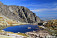 Malé Spišské pleso, nad ním Lomnická veža