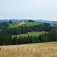 Výhľad z osady Szewcy na Rusiński Wierch a hrebeň Zamaguria