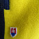 Maličký nenápadný slovenský znak pri vrecku