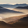 Ranné hmly zakrývajú Revúcku dolinu, pohľad z Rakytova