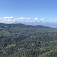 Pohľad na Vysoké Tatry ponad doliny a hrebene Slovenského raja