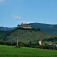 Historická fotka hradu Krásna Hôrka, poza neho vedie cesta na Úhornianske sedlo